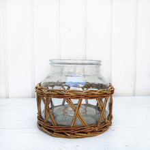 Load image into Gallery viewer, glass container wrapped in brown wicker