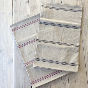 natural colored runner with sets of black pinstripes