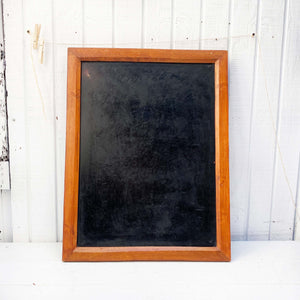 rectangular chalkboard with brown wood frame 