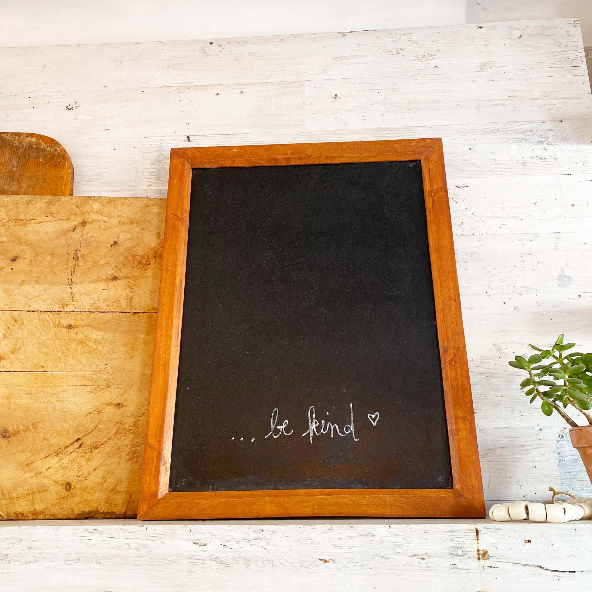rectangular chalkboard with brown wood frame 