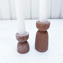 Load image into Gallery viewer, terra cotta colored concrete hour glass shaped taper candle holder