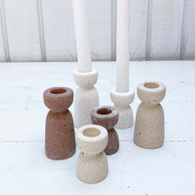 Load image into Gallery viewer, concrete hour glass shaped taper candle holders in varying colors