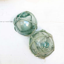 Load image into Gallery viewer, round green/blue glass balls, some with rope around them