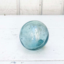 Load image into Gallery viewer, round green/blue glass balls, some with rope around them