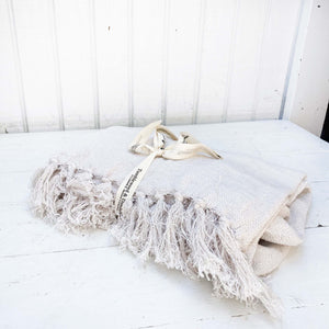 natural colored linen throw blanket with fringe