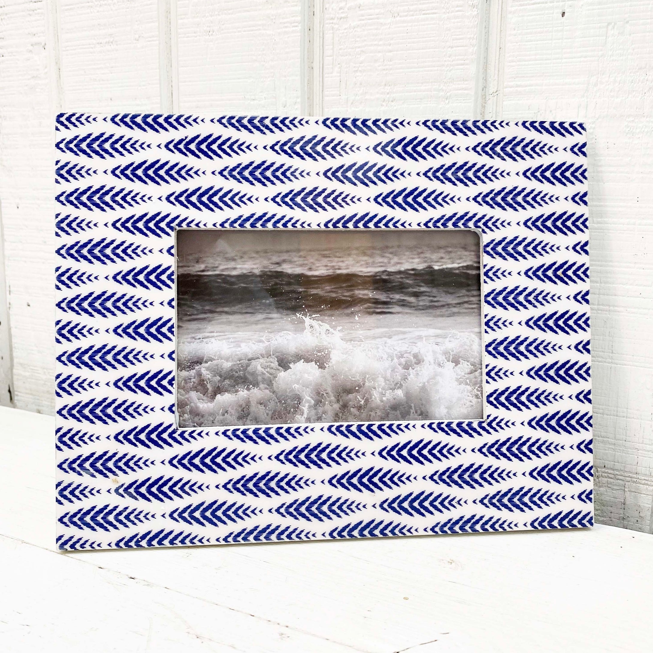 blue and white patterned picture frame