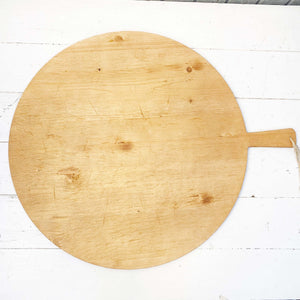 large round charcuterie board with handle