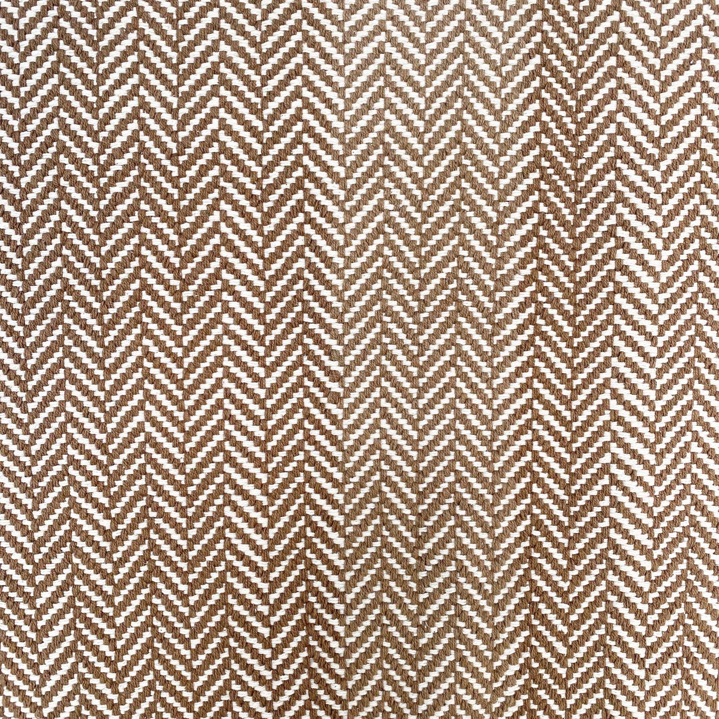 brown and cream herringbone patterned cotton rug