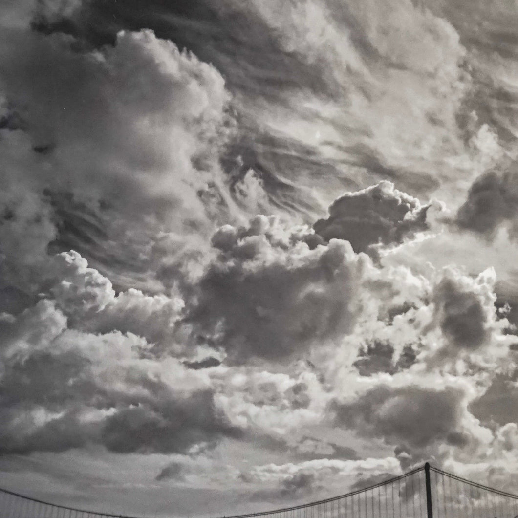 storm clouds with top of bridge