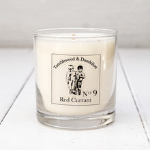 Load image into Gallery viewer, Clear glass candle, Tumbleweed and Dandelion logo, red currant scent