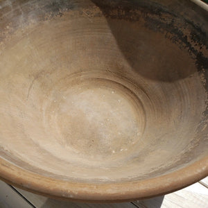 large brown decorative clay bowl