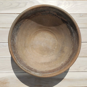 large brown decorative clay bowl