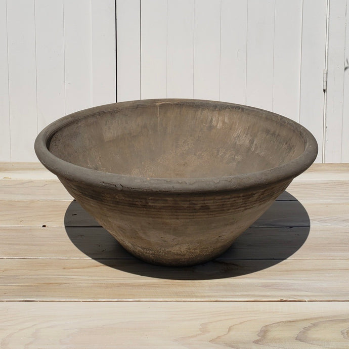 large brown decorative clay bowl