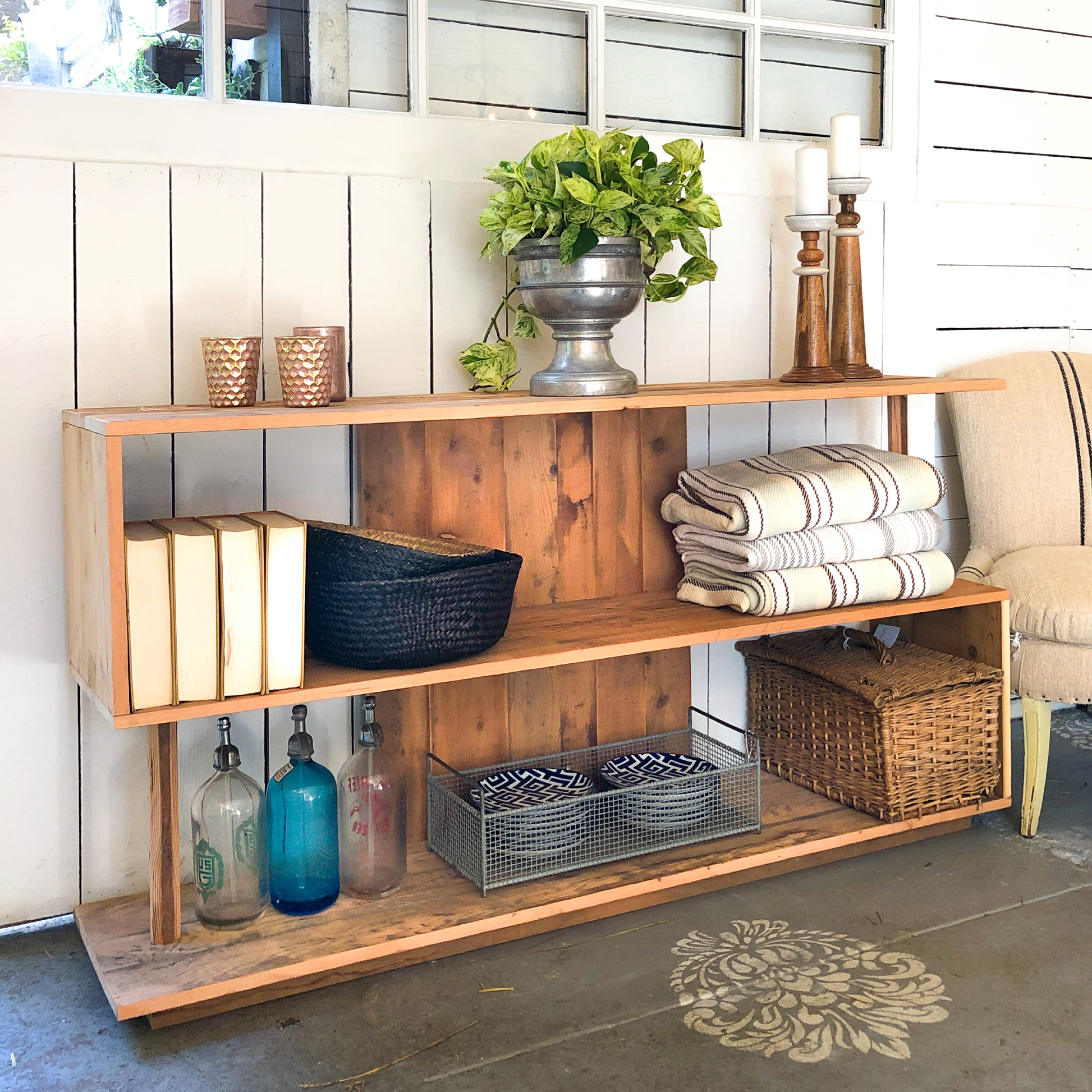 The Ess Shelf-clean modern 3 shelf "s" style open shelf, warm stained wood