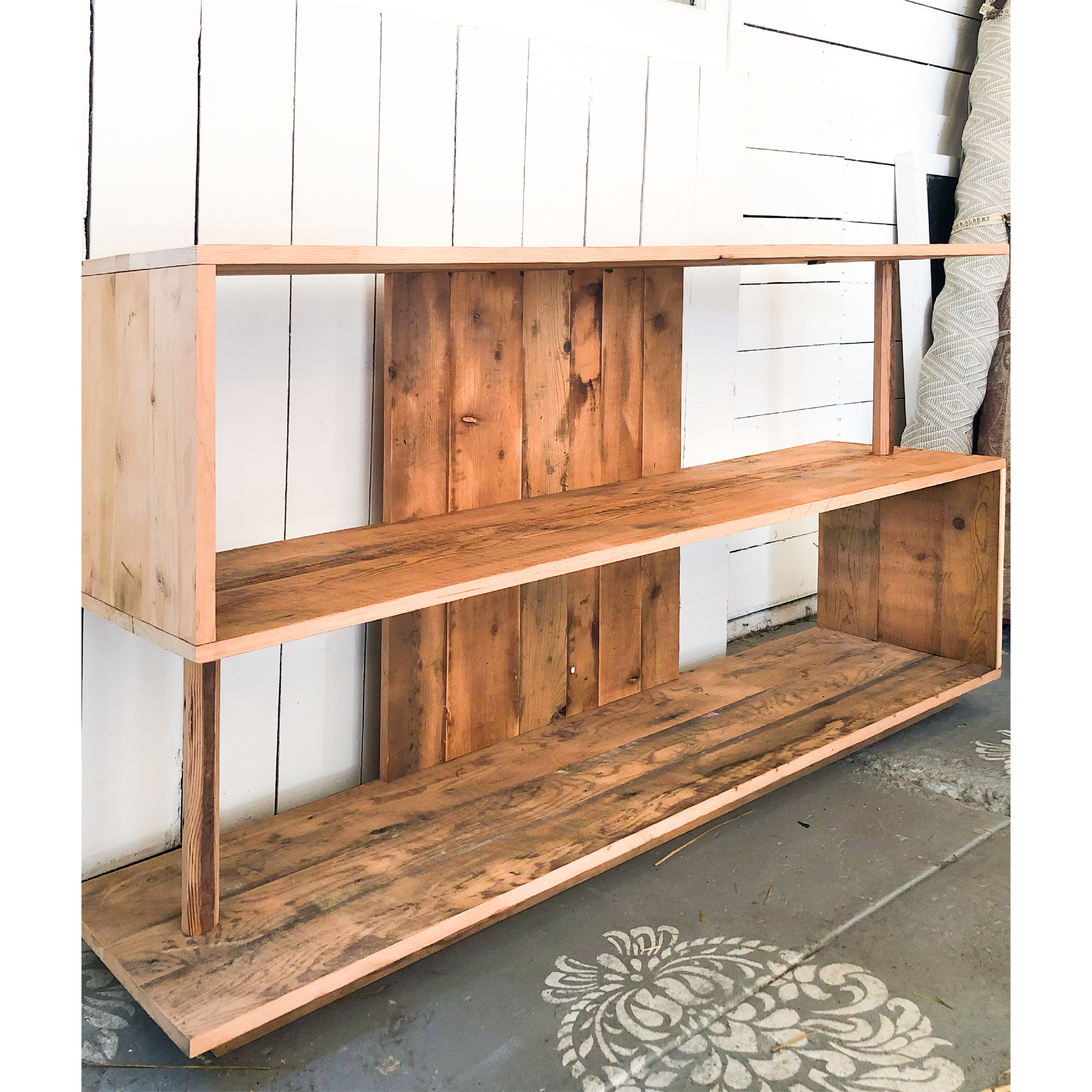 The Ess Shelf-clean modern 3 shelf "s" style open shelf, warm stained wood