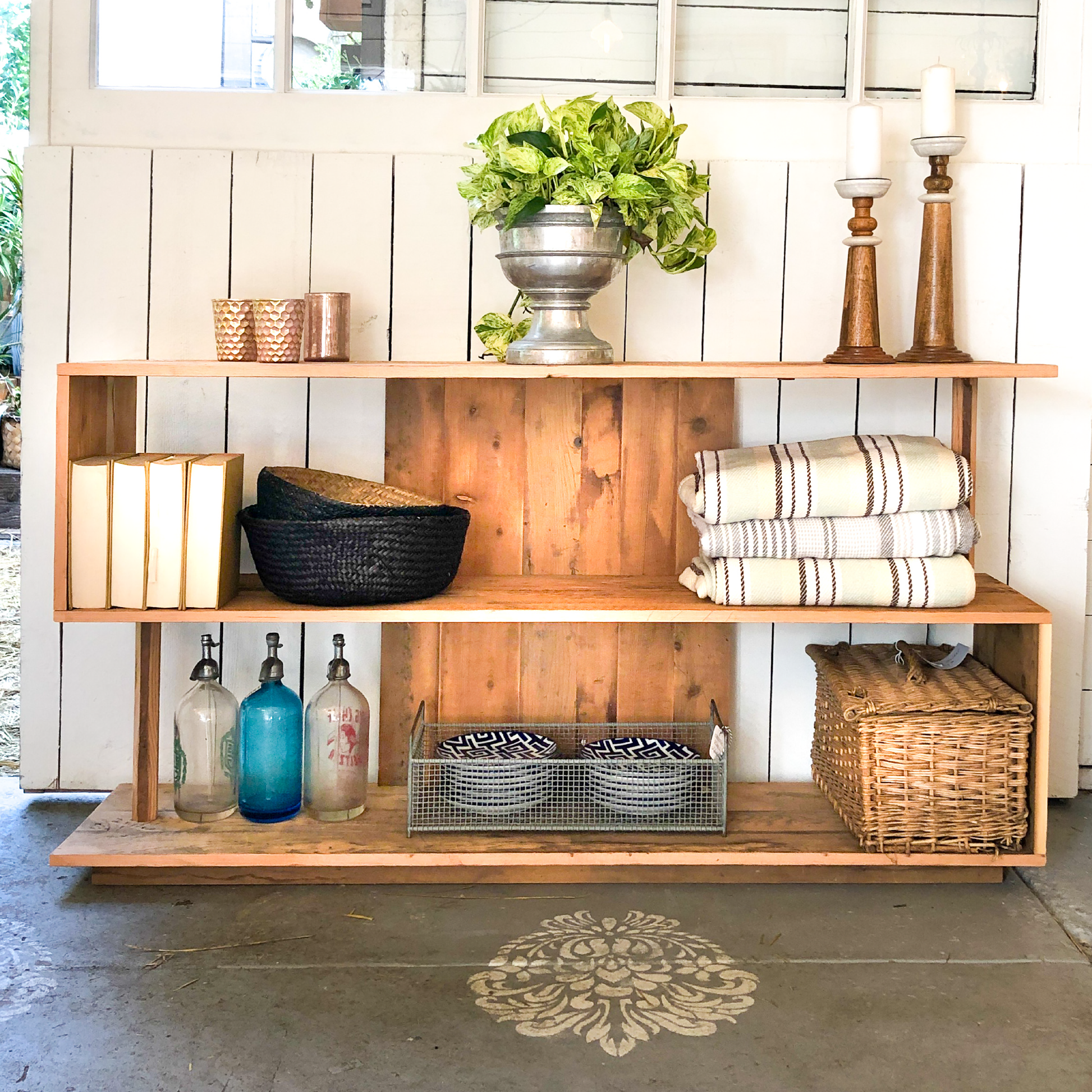 The Ess Shelf-clean modern 3 shelf "s" style open shelf, warm stained wood