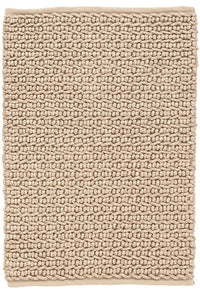 tan colored woven rug