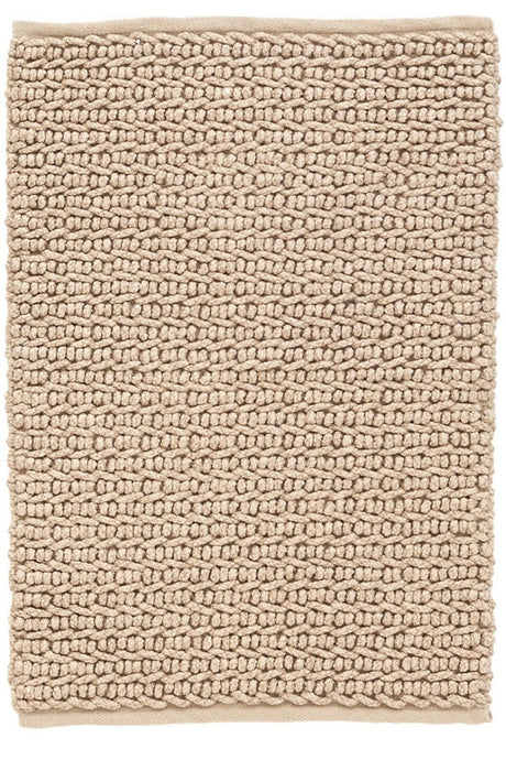 tan colored woven rug