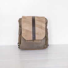 Load image into Gallery viewer, bags made from vintage military canvas, varying colors of army green, khaki and browns with dark leather straps