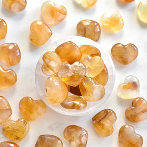 golden colored heart shaped crystals